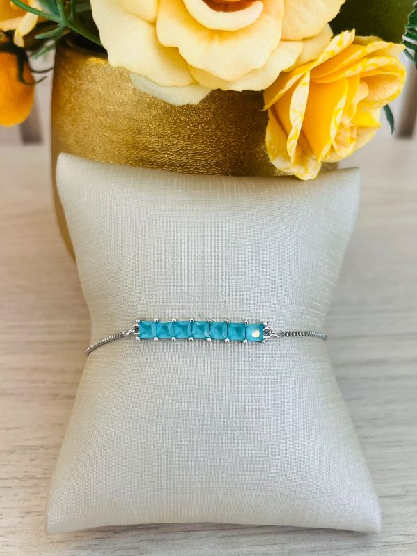 PULSEIRA COM AJUSTE 7 PEDRAS ZIRCONIA