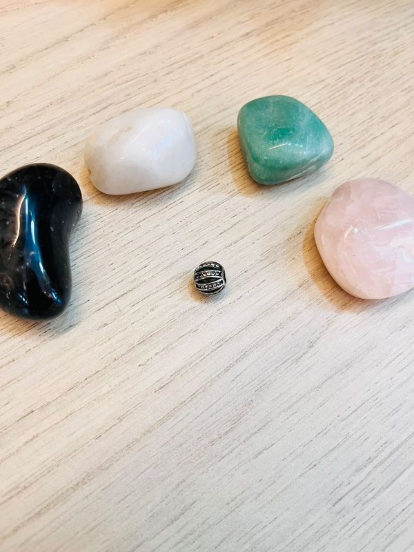 BERLOQUE REDONDO COM RISCO DE ZIRCONIA