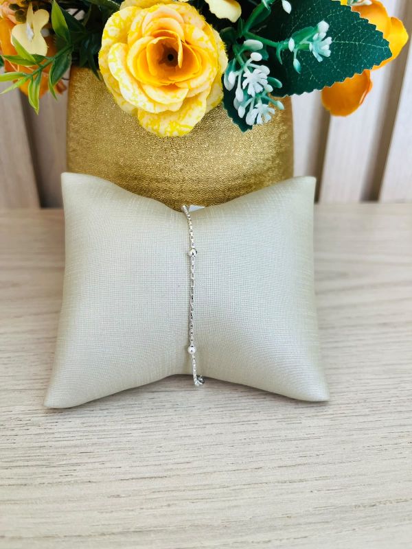 PULSEIRA SIMPLES COM QUATRO BOLINHAS
