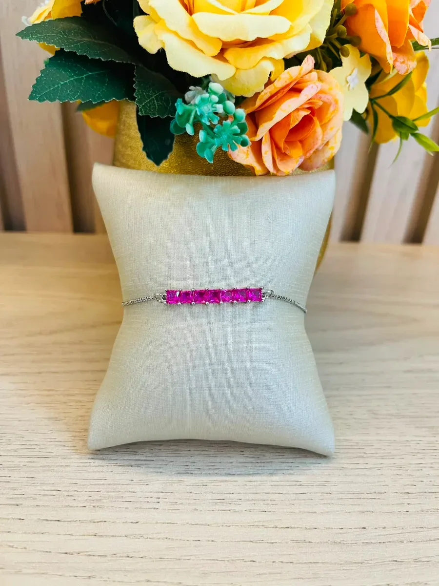 PULSEIRA COM AJUSTE 7 PEDRAS ZIRCONIA PINK